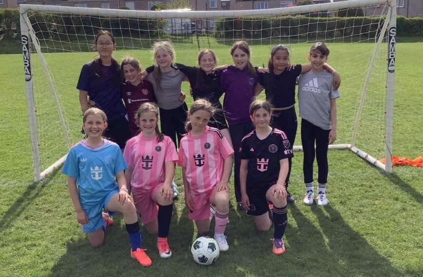 Currie Primary School girls with new football goal