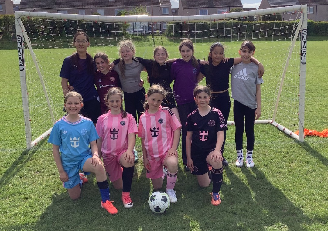 Currie Primary School girls with new football goal