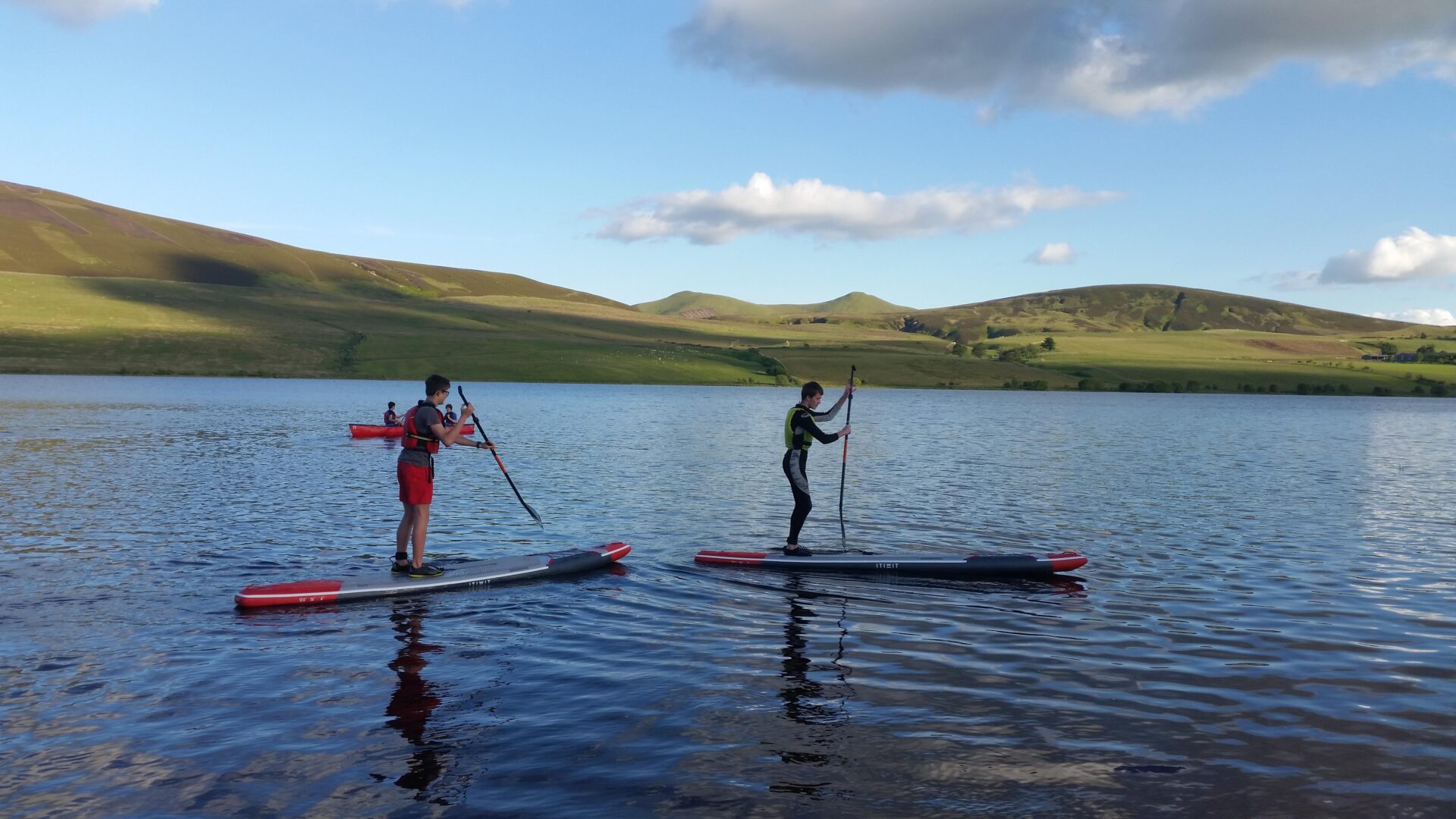 Wildfire Explorer Scouts using paddleboards
