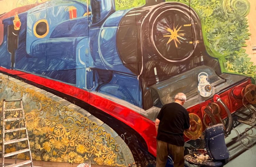 A photo of a train being painted for the tunnel